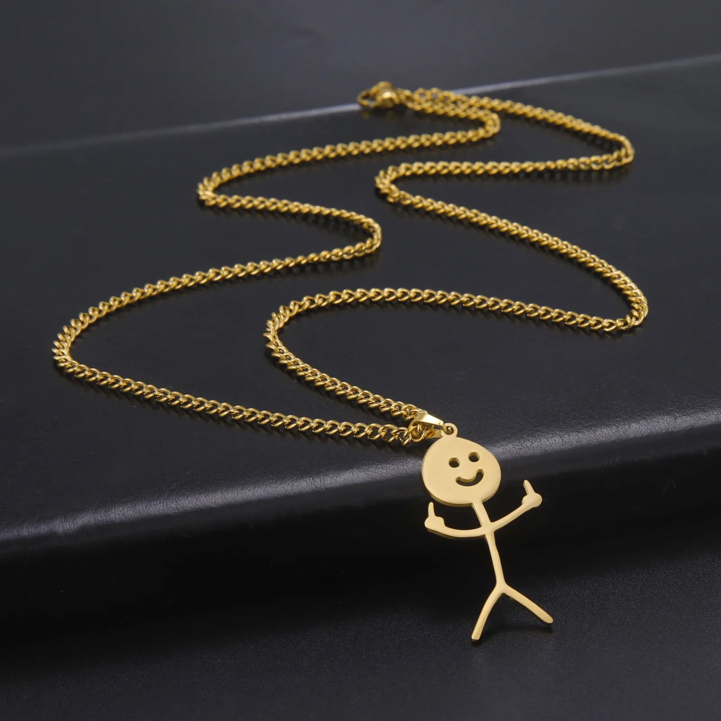 collier-doigt-dhonneur-or
